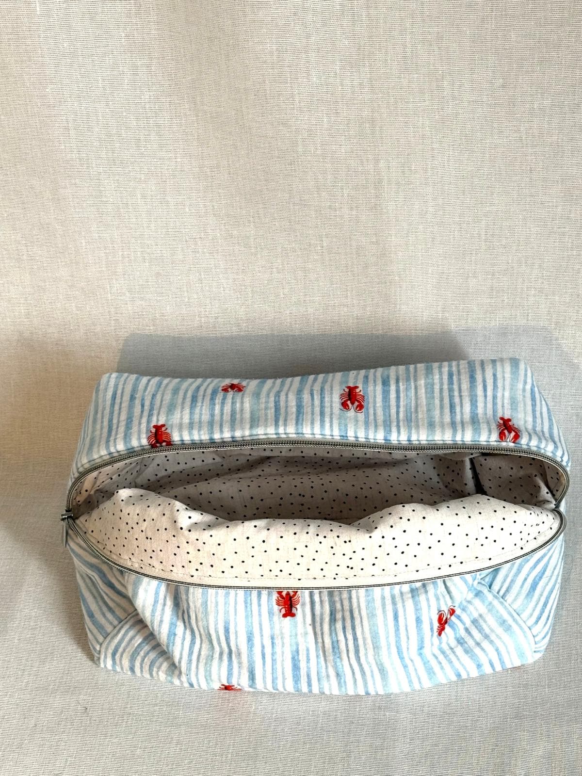Toiletry bag lobsters open